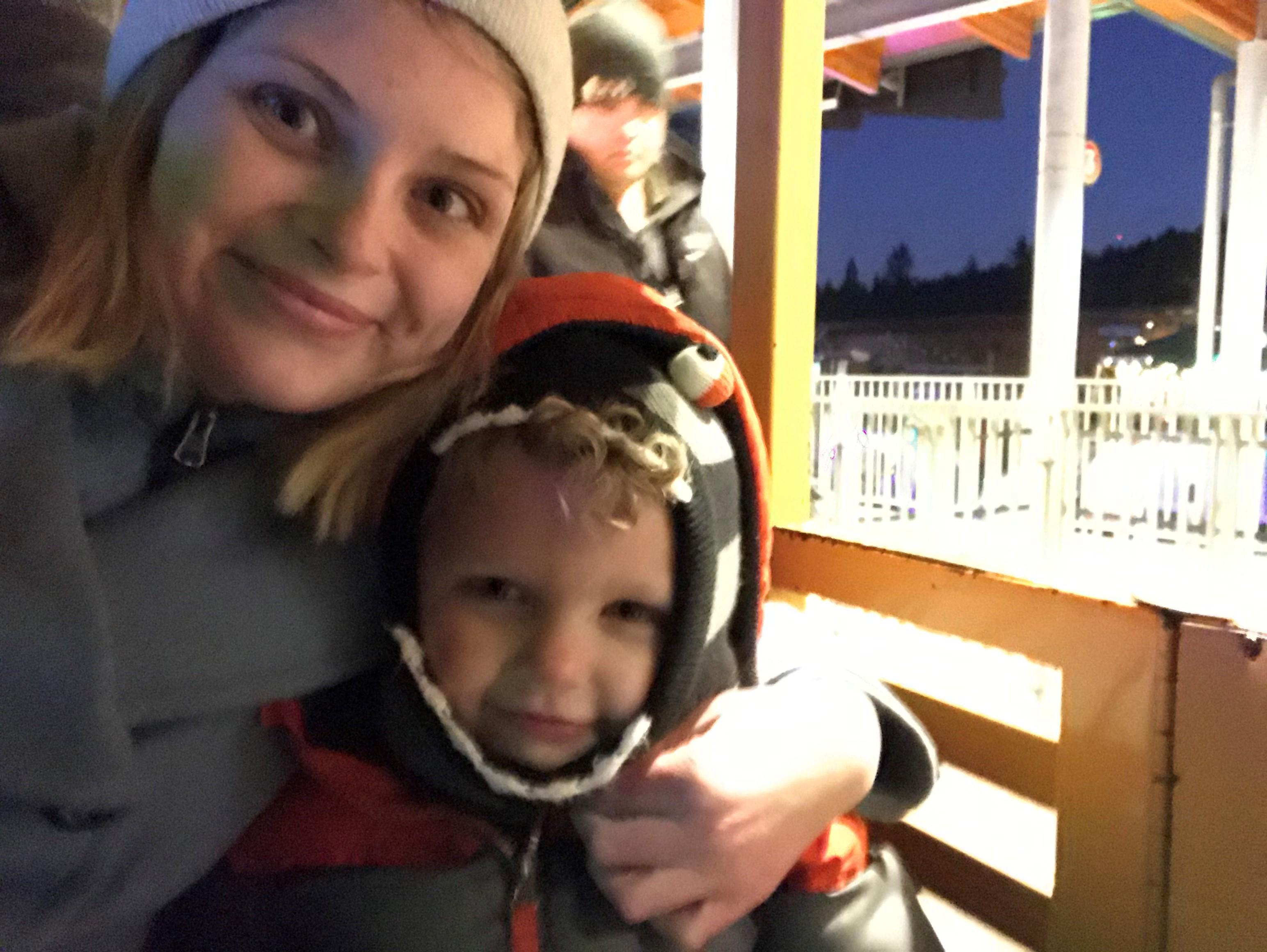 Steph and her son on the train at the Oregon zoo for zoolights